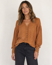 Blouse tricotée douce à col en V et manches longues pour femme avec boutons