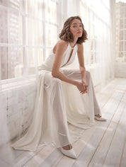 Elegante Dames Jumpsuit Met Open Rug En Halterhals