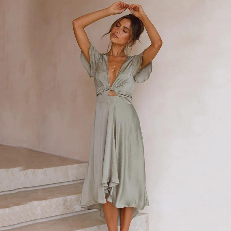 Eline-Rose - Elegante jurk met V-hals en wikkel effect