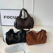 Sac à bandoulière robuste pour femme en cuir vegan avec fermetures éclair et poches