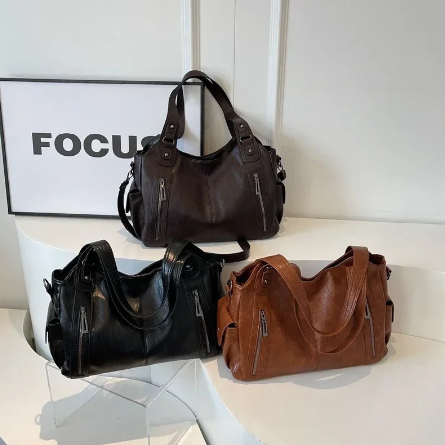 Sac à bandoulière robuste pour femme en cuir vegan avec fermetures éclair et poches
