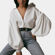 Blouse oversize pour femmes avec décolleté en V profond et manches remarquables