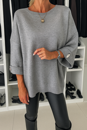 Damska oversizeowa bluzka z rękawami 3/4 i detalami z guzikami