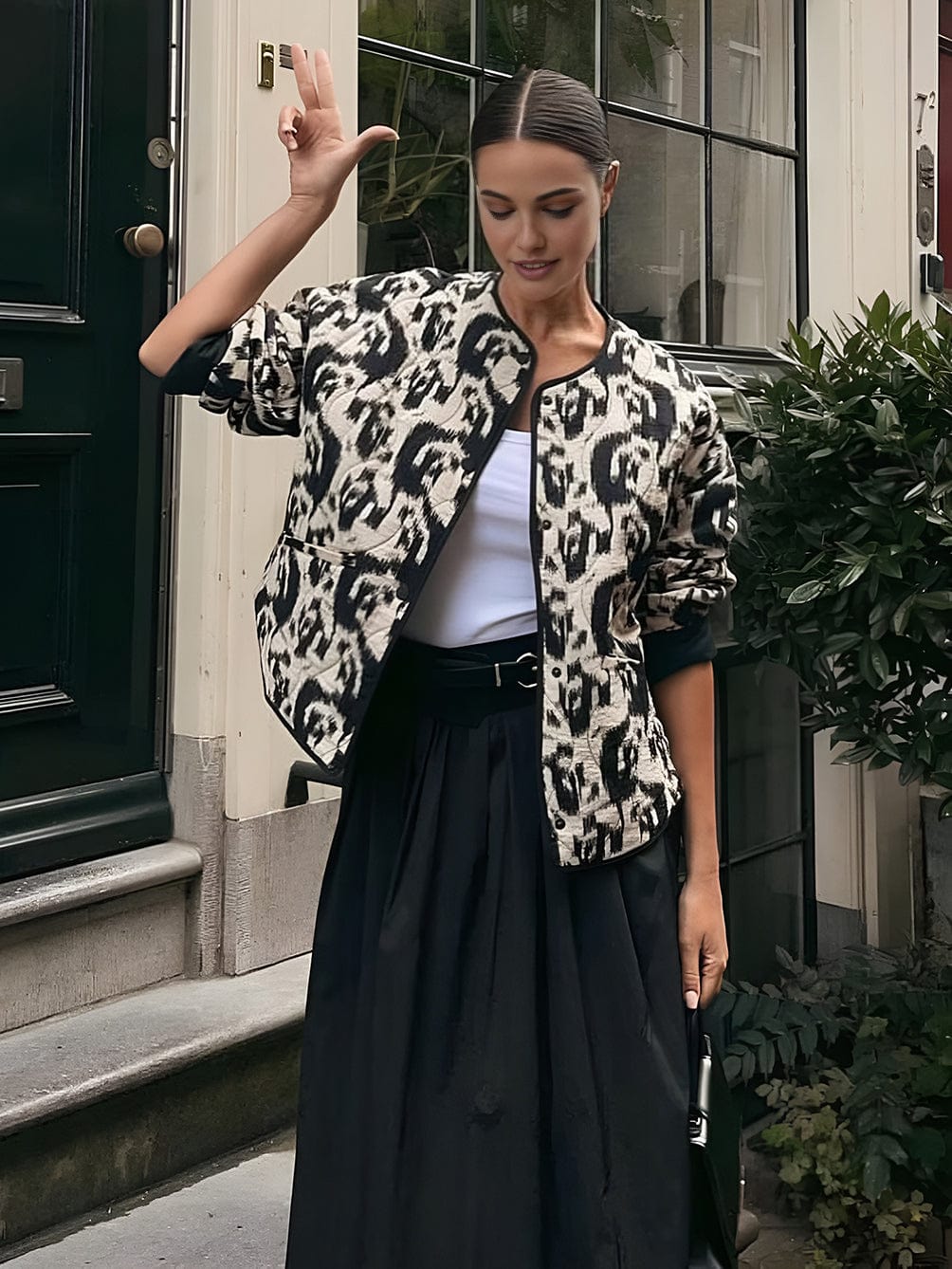 Veste matelassée avec imprimé abstrait et fermeture à boutons-pression