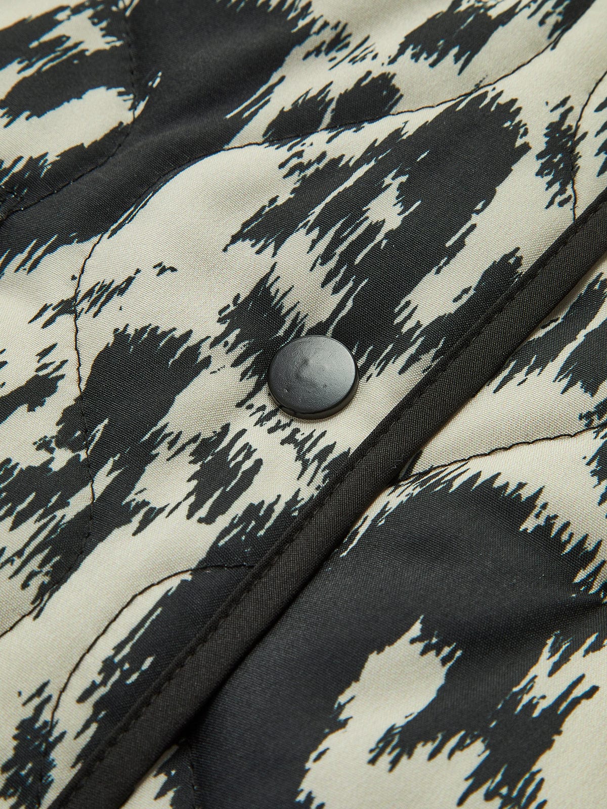 Veste matelassée avec imprimé abstrait et fermeture à boutons-pression