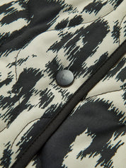 Veste matelassée avec imprimé abstrait et fermeture à boutons-pression