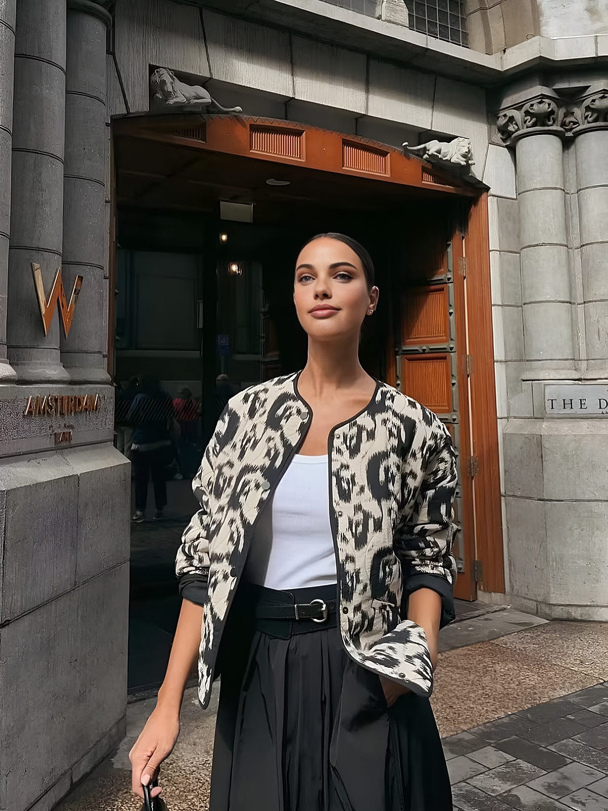 Veste matelassée avec imprimé abstrait et fermeture à boutons-pression