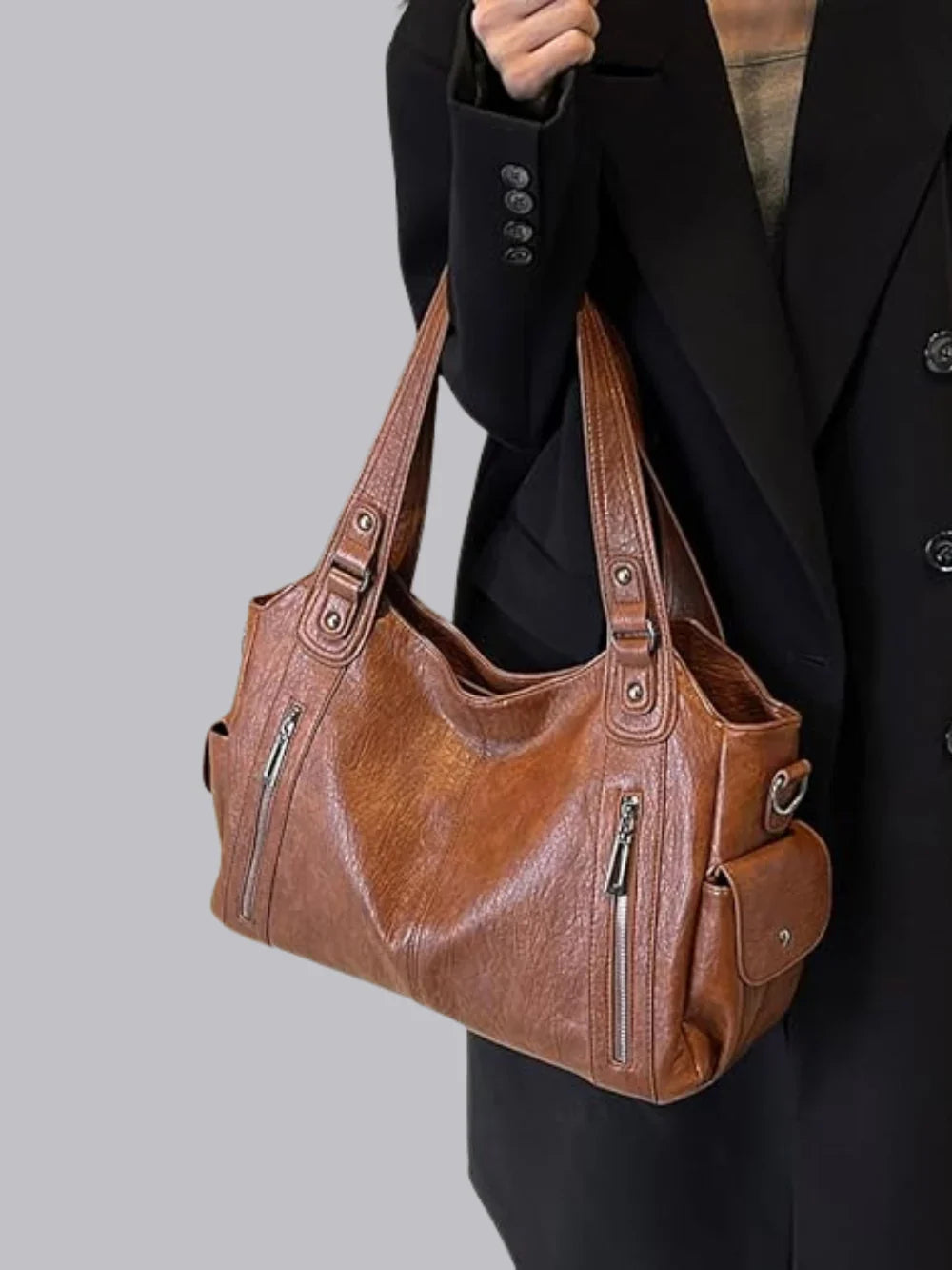 Sac à bandoulière robuste pour femme en cuir vegan avec fermetures éclair et poches