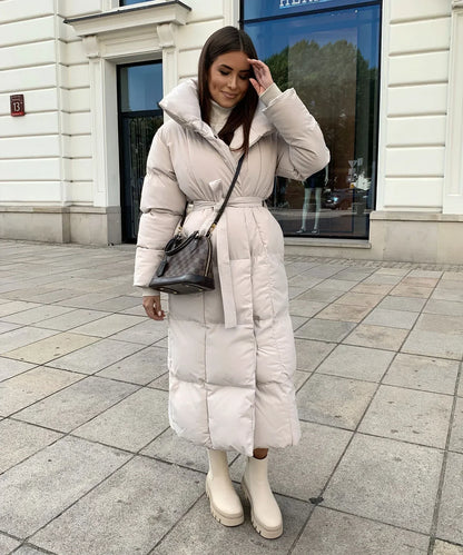 Vrouwen Chic Lange Puffer Winterjas met Tailleriem en Hoge Kraag