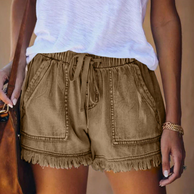 Comfortable denim shorts with elastic waistband and frayed edges