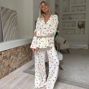 Soft Two-Piece Pajama Set for Women with Heart Print and Button Closure