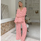 Soft Two-Piece Pajama Set for Women with Heart Print and Button Closure