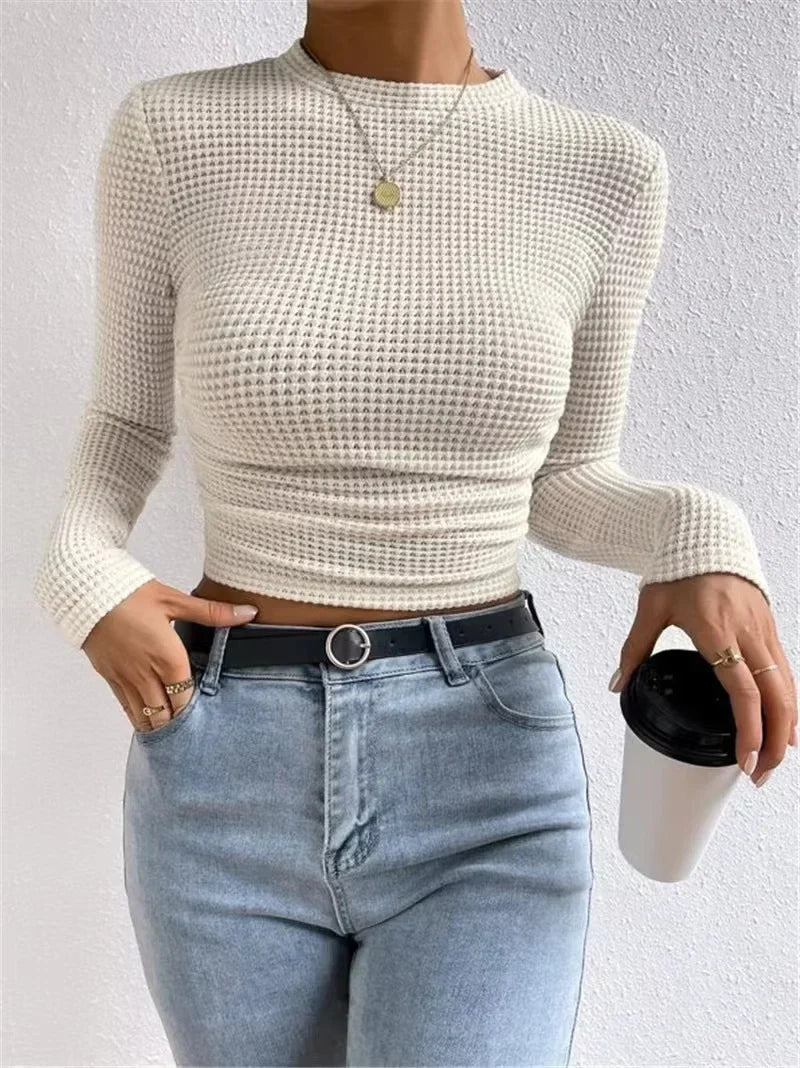 Dopasowany crop top z długim rękawem i strukturą