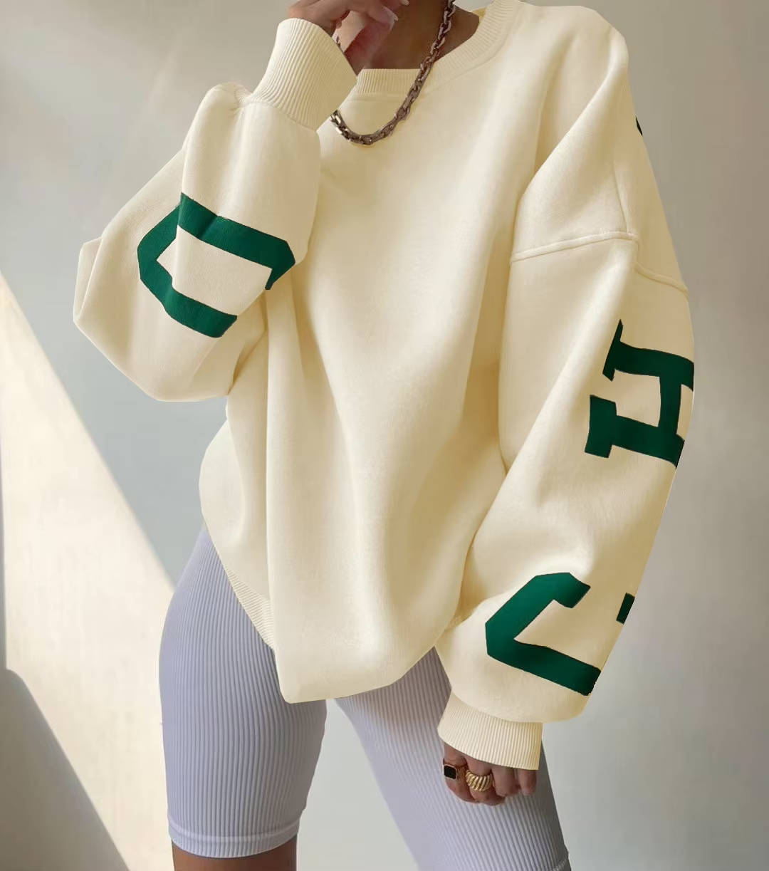 Creme oversized sweatshirt met groene CHICAGO NEW YORK EST 2015 opdruk achterop