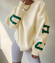 Creme oversized sweatshirt met groene CHICAGO NEW YORK EST 2015 opdruk achterop