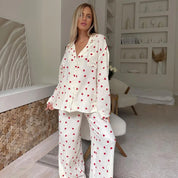Soft Two-Piece Pajama Set for Women with Heart Print and Button Closure