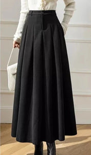 Elegante Maxi spódnica z wysokim stanem i głębokimi zakładkami