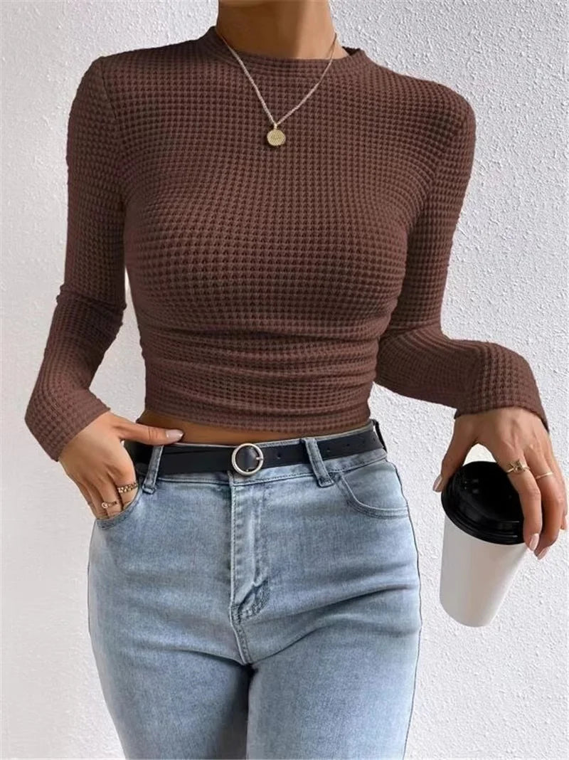 Dopasowany crop top z długim rękawem i strukturą