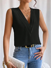 Elegant Sleeveless Blouse with Deep V Neck and Pleated Detail