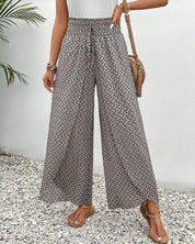 Stylowe przewiewne spodnie z nadrukiem i szerokimi nogawkami