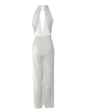 Elegante Dames Jumpsuit Met Open Rug En Halterhals