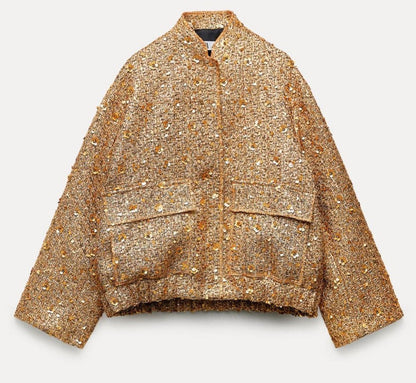Chique dames jas met gouden glitter pailletten