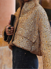 Elegancka damska kurtka ze złotymi błyszczącymi cekinami