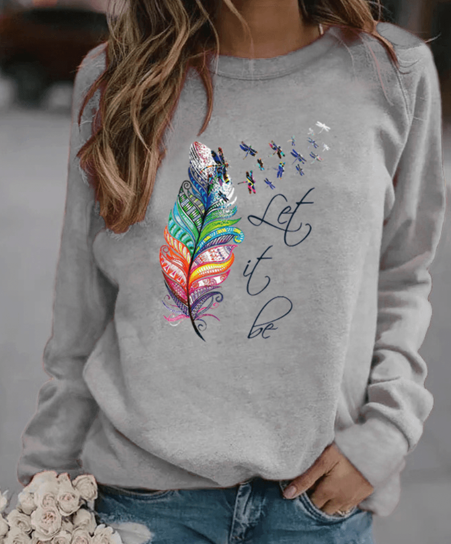 Sweatshirt Drinna hivernal pour femme avec détails plume, coupe confortable et doublure douce adaptée aux journées froides.
