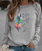 Sweatshirt Drinna hivernal pour femme avec détails plume, coupe confortable et doublure douce adaptée aux journées froides.