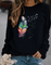 Sweatshirt Drinna hivernal pour femme avec détails plume, coupe confortable et doublure douce adaptée aux journées froides.