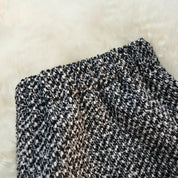 Jupe midi douce gris foncé pour femmes avec fente et détails à boutons