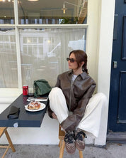 Veste en cuir oversize pour femmes avec fermeture éclair et détail ceinture