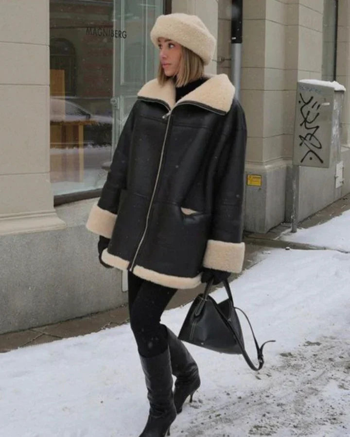 Oversize'owa czarna skórzana kurtka zimowa z ociepleniem teddy dla pań